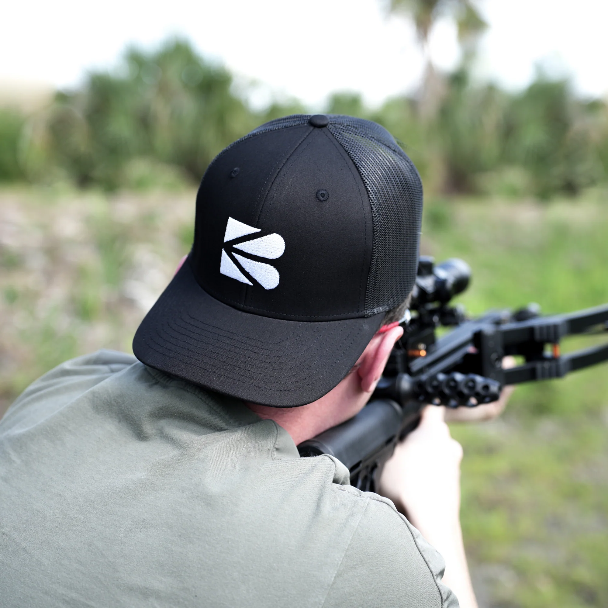 Black Trucker Cap – Classic Mesh-Back Hat with Embroidered Logo - Image 4