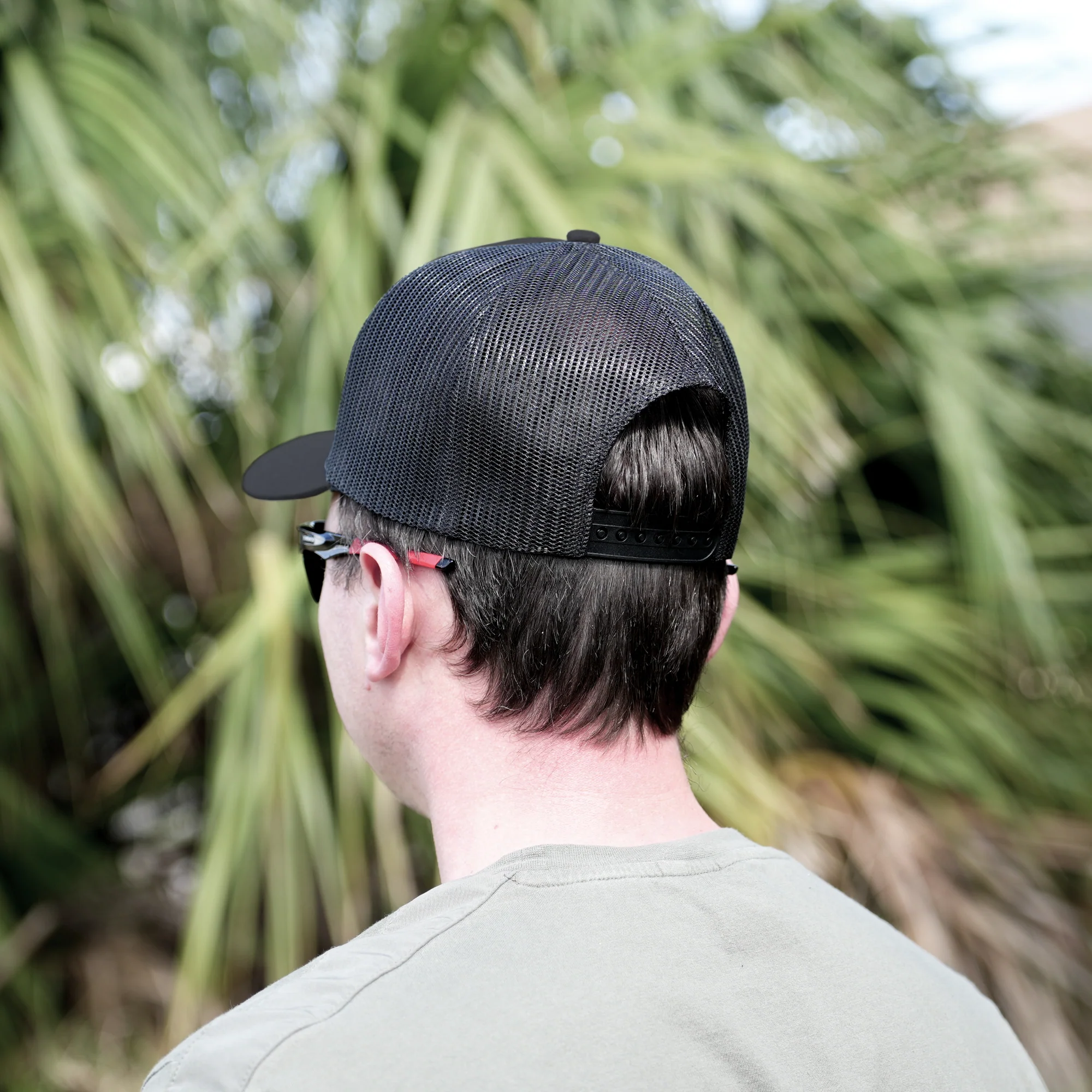 Black Trucker Cap – Classic Mesh-Back Hat with Embroidered Logo - Image 5